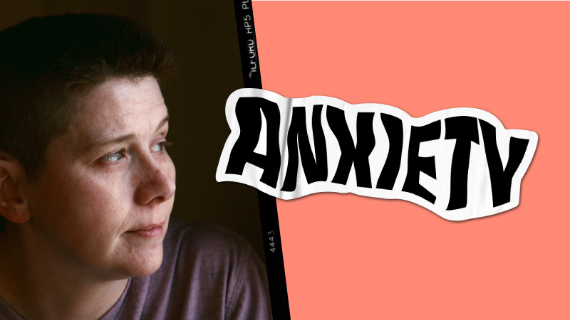 Person looking at the words “Anxiety”.