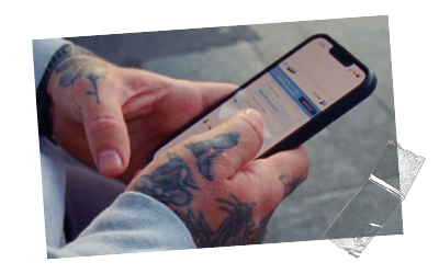 A photo of someone using the CALM webchat service and receiving support.